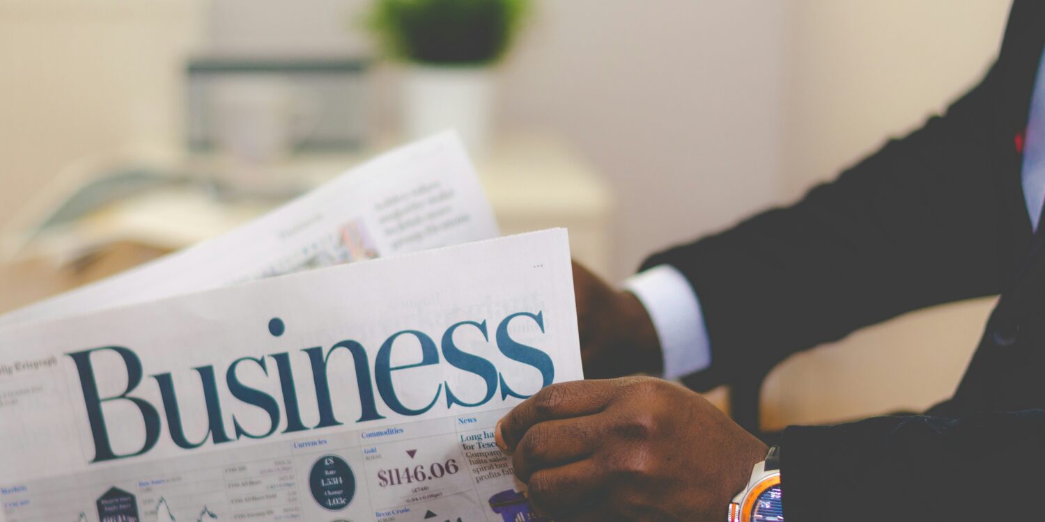 Business man holding paper