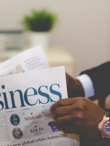 Business man holding paper