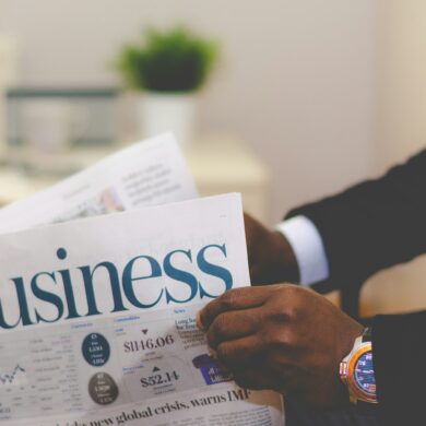 Business man holding paper